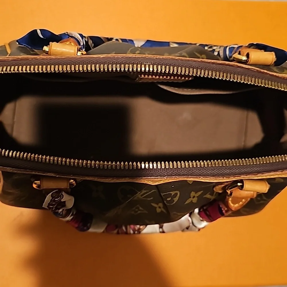 Authentic Louis Vuitton Tivoli PM Bag - Picture 5 of 16
